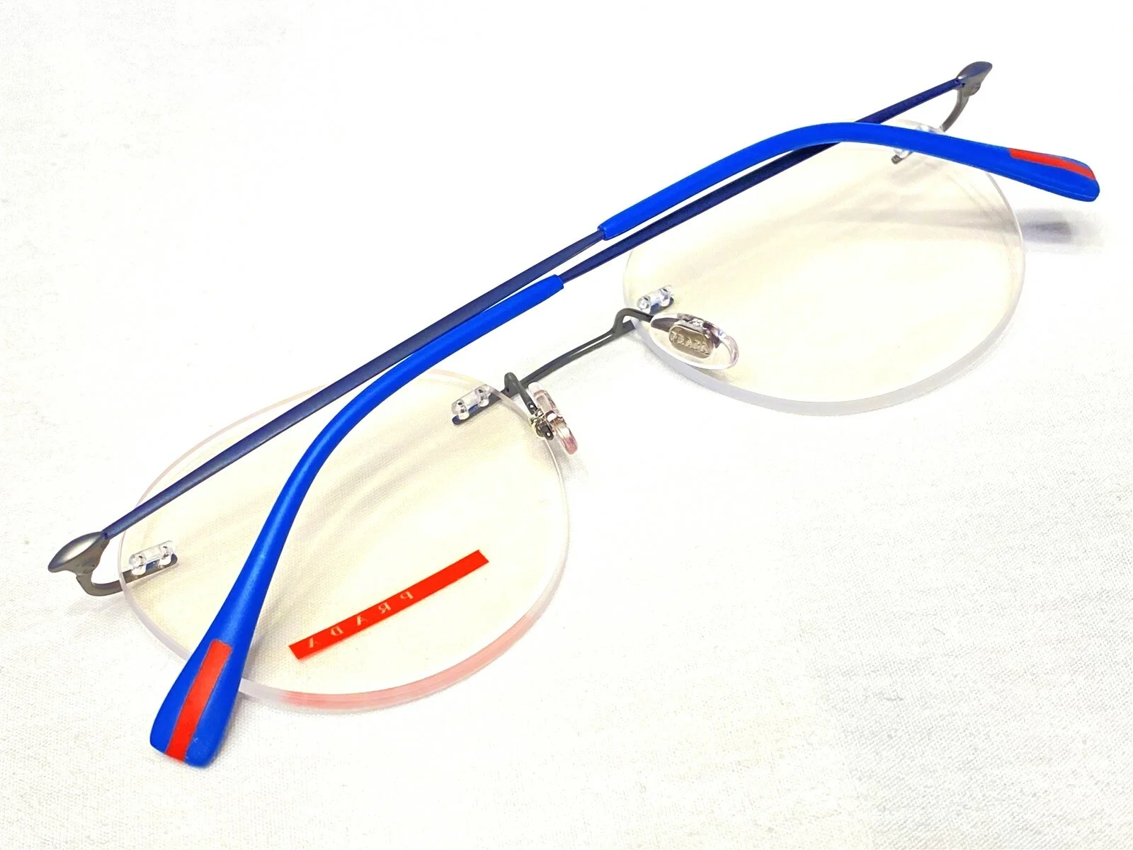 NEW Prada Linea Rossa VPS52I 7CQ-1O1 Silver Rimless Eyeglasses Frames 52/19~140 2